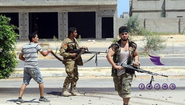 مليشيا باب تاجوراء تقتحم مقر الأمن الداخلي في طرابلس - 60 205533 insurgent assault policeman