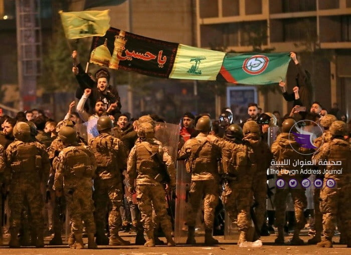 اشتباكات بين محتجين لبنانيين ومؤيدين لحركتي حزب الله وأمل بوسط بيروت - 1b36f747237abd4c6927f0025dc448b4f9ab7cc5