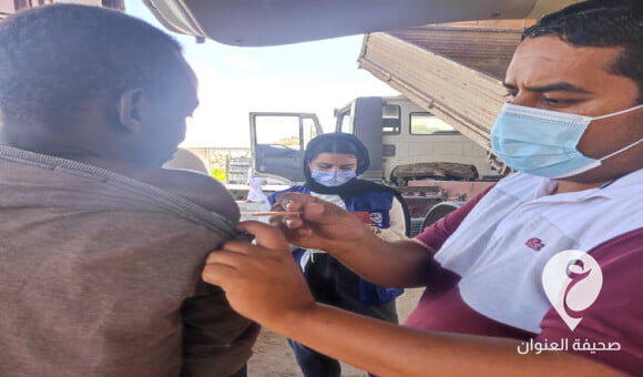 تطعيم وافدين في بنغازي ضد كورونا ضمن حملة تشرف عليها منظمة الهجرة الدولية - PSD العنوان 2022 08 30T225424.135