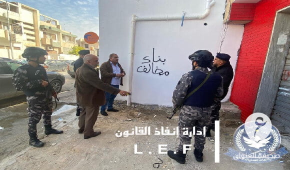 إنفاذ القانون توقف بناء محل بالمخالفة في عمارة في منطقة بن عاشور في طرابلس - 1 16