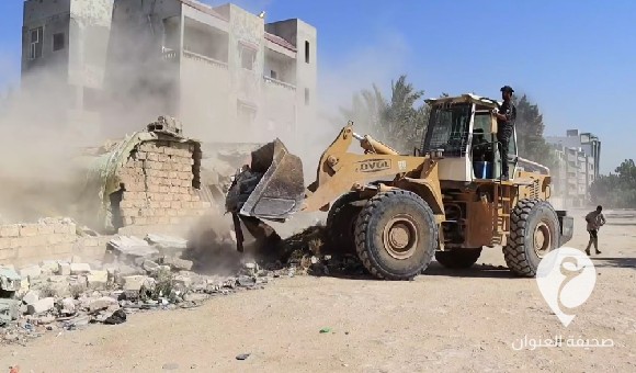 الحرس البلدي بنغازي يشن حملة لإزالة المباني العشوائية المخالفة على الطريق السريع 2 الحرس البلدي بنغازي يشن حملة لإزالة المباني العشوائية المخالفة على الطريق السريع