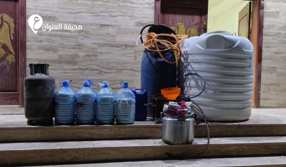ضبط شخصين لتورطهما في صناعة وترويج الخمور ببنغازي - psd elenwan 1 30