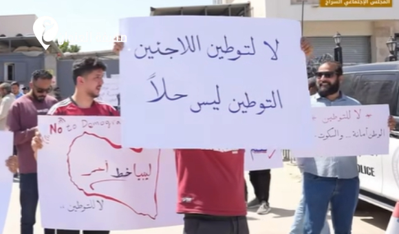 أهالي السراج يطالبون بإغلاق مقر مفوضية اللاجئين احتجاجا على تزايد المهاجرين - psd elenwan 2026 05 14T151838.221